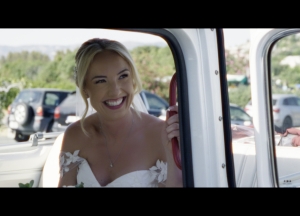 Bride Kerry smiling brightly on her wedding day