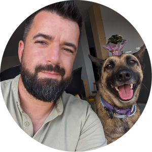 Roman Horwarth, founder of Lux Arte Studio, smiling with his happy brown dog