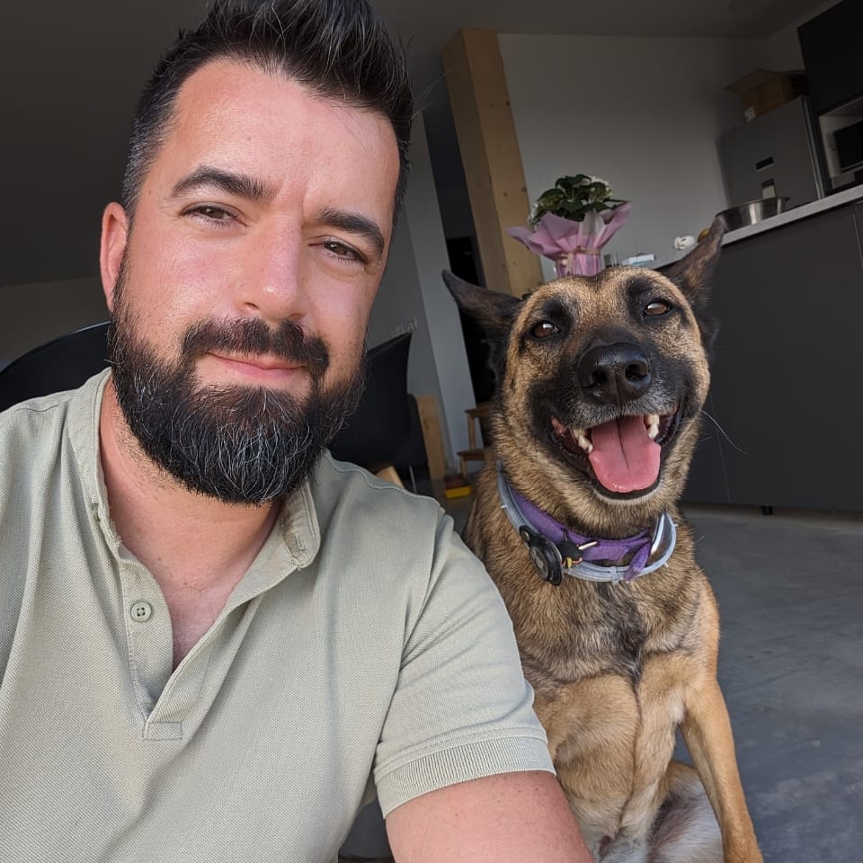 Roman Horwarth – Founder of Lux Arte Studio with His Dog Roman Horwarth, founder of Lux Arte Studio, smiling with his dog Lexi